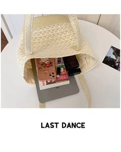 Detailed top view of a cream lace woven tote bag showing its spacious inner compartment