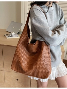 Brown woven leather hobo shoulder bag with minimalist design for women fashion