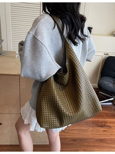 Large olive green woven hobo bag for women with minimalist intrecciato texture design