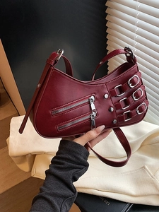 Chic burgundy pleated leather shoulder bag with punk buckles and metallic zippers