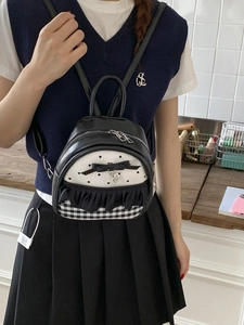 Sweet preppy style mini backpack with black heart prints and ribbon bow details