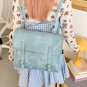Retro light blue leather backpack with large capacity and double buckle flap design