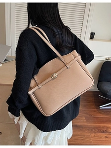 Large apricot leather tote bag with lychee texture and buckle detail for office commute
