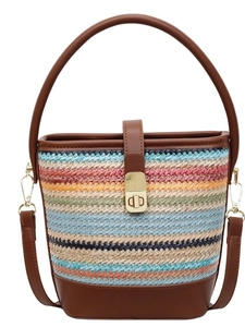 Rainbow striped woven straw bucket bag with brown leather trim and metal lock closure
