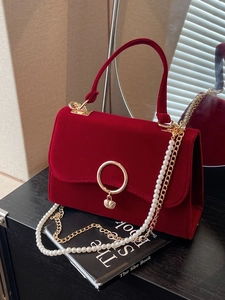 Elegant deep red velvet crossbody bag with pearl chain and golden ring buckle