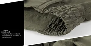 Detail of army green quick-dry shorts featuring a durable elastic waist with fine stitching