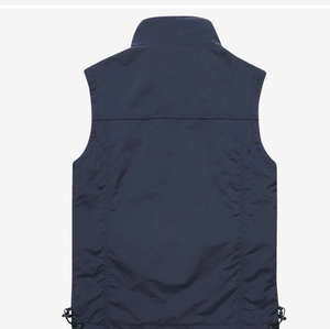 Detail view of the back of a dark blue outdoor vest featuring adjustable drawstrings