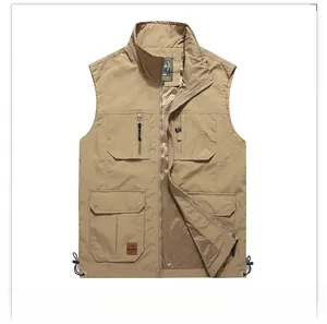 Detail of khaki outdoor fishing vest showing functional pockets and breathable mesh lining