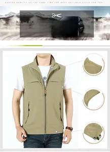 Detail of khaki outdoor vest showing stand collar, zip pockets and adjustable hem design