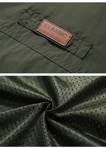 Detail of waterproof olive green fabric with leather patch and breathable mesh lining
