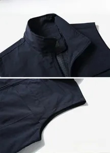 Detail of outdoor vest featuring standing collar zipper and breathable mesh lining