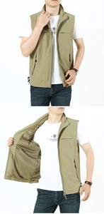 Detail of khaki outdoor vest showing mesh lining, stand collar zipper and adjustable hem