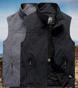 Detail view of lightweight outdoor fishing vests in grey and black with breathable mesh lining