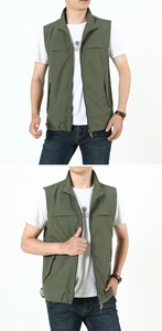 Detailed view of army green outdoor vest with stand collar and zipped pockets for men
