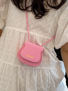 Mini pink semi-circle crossbody bag with orin letter logo and thin shoulder strap