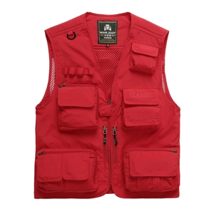 Detail of red tactical vest showing multi-pocket design and breathable mesh lining