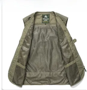 Detail view of the breathable mesh lining and interior label on this green outdoor vest