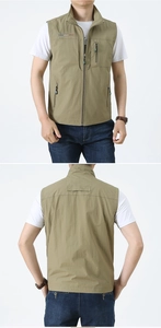 Detail of outdoor utility vest with functional zipper pockets and stand-up collar design