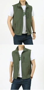 Close-up of army green outdoor vest showing vertical chest zipper and stand collar