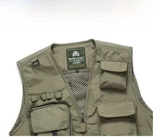 Detail view of olive green outdoor vest featuring breathable mesh lining and multiple pockets