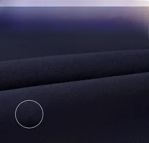 Detailed view of quick-dry navy fabric texture showing breathable moisture-wicking fibers