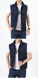 Detail of dark blue stand-collar vest with zip closure and chest stripe design