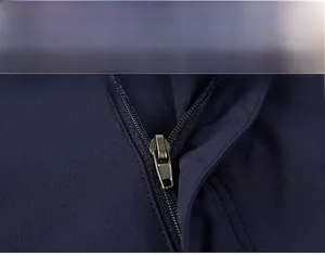Detail of high-quality metal zipper and durable navy blue quick-dry fabric texture