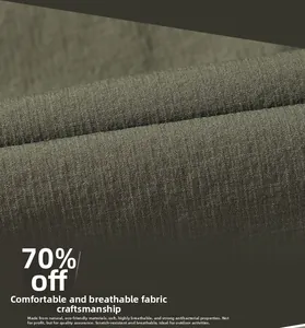 Macro detail of olive green ripstop fabric with breathable and durable grid texture