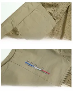 Detail of breathable mesh lining, inner pocket and brand embroidery on khaki outdoor vest