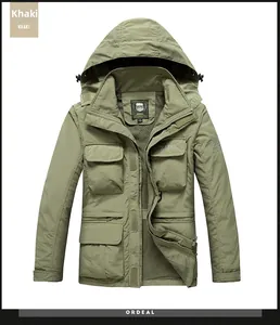 Detail of khaki outdoor jacket showing four flap pockets and water-resistant fabric