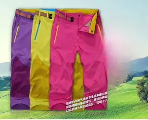 Detail of breathable quick-dry women's shorts with woven belts and zipper pockets