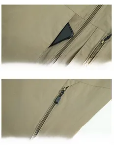 Detail of khaki outdoor vest showing functional pockets and zipper with sports tag