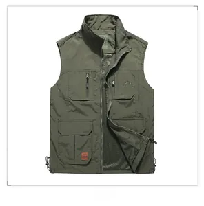 Detail of army green outdoor tactical vest with breathable black mesh lining