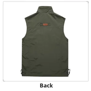 Detail of army green outdoor vest back featuring a classic leather patch and adjustable hem