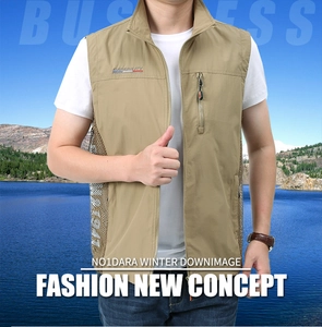Detail of khaki outdoor vest showing white mesh side panels for enhanced breathability