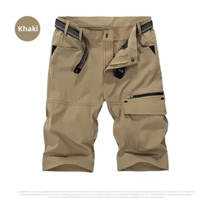 Detail of khaki quick-dry cargo shorts featuring elastic waistband and woven belt