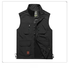 Detail view of black multi-pocket outdoor vest featuring mesh lining and durable zippers