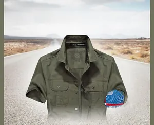 Detail of army green cotton short sleeve shirt showing chest pockets and outdoor logo