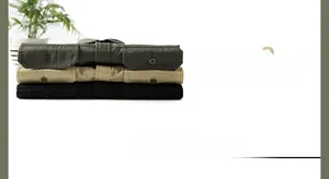 Three-color stack of cotton short-sleeve shirts showing button detail and collar texture