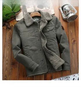Detail of fleece lining and American Legend embroidery on olive green worker jacket