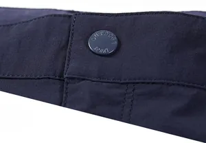 Detail of waist button on navy blue outdoor shorts with Outdoor Sport engraving