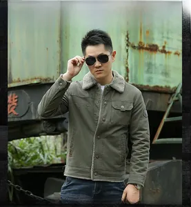 Men's olive green canvas work jacket with thick grey sherpa fleece collar and metal buttons
