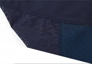 Close-up of quick-dry shorts featuring honeycomb texture and breathable mesh splicing