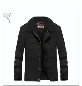 Detail of black men's winter cargo jacket with warm faux fur collar and four pockets