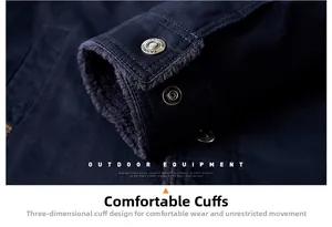 Close-up of winter jacket cuff showing warm grey fleece lining and embossed metal button