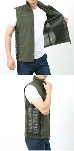 Detail of army green outdoor vest showing breathable mesh lining and stand collar