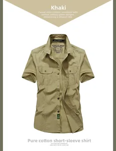 Detail of khaki cotton short-sleeved shirt with dual buttoned pockets and outdoor label