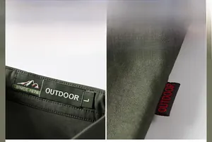 Detail view of dark green cotton shirt showing collar label, side tag, and twill fabric texture