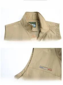 Detailed close-up of khaki outdoor vest collar with mesh lining and chest embroidery