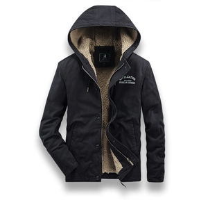 Close-up of black hooded winter jacket with warm khaki fleece lining and zipper detail